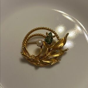 Elegant Gold and Green Brooch